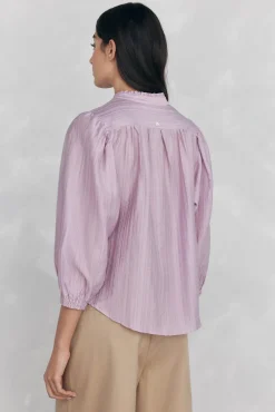 Blusa amplia lisa