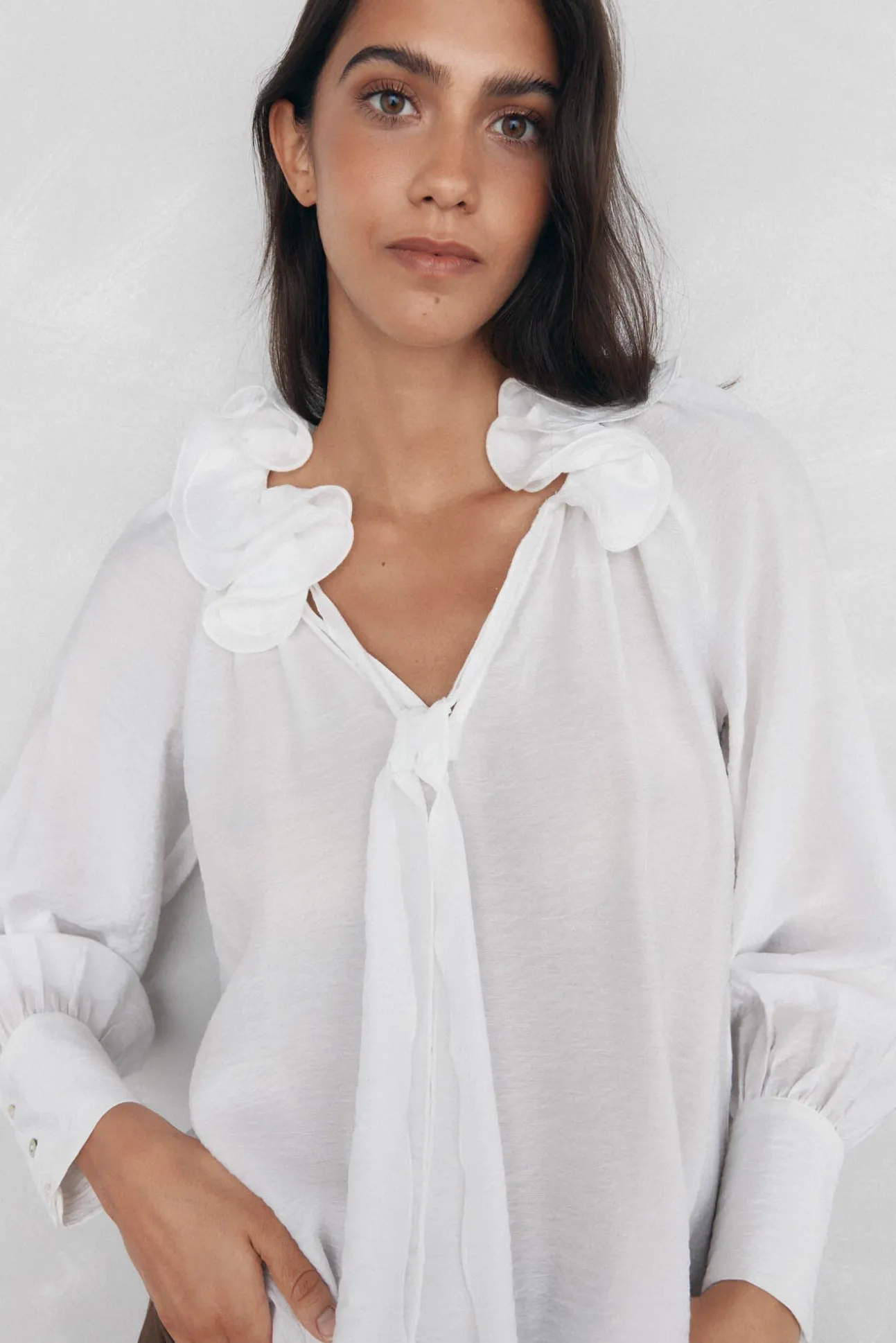 Blusa amplia lisa