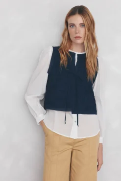 Blusa amplia lisa