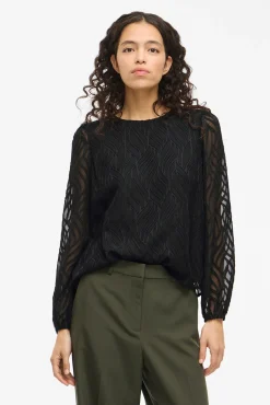 Blusa manga larga con cuello redondo