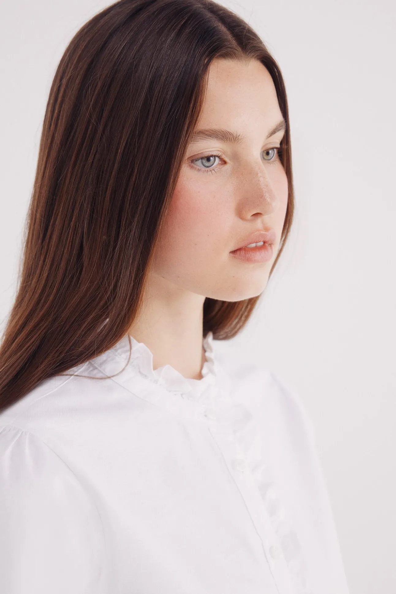 Blusa Oxford cuello volante