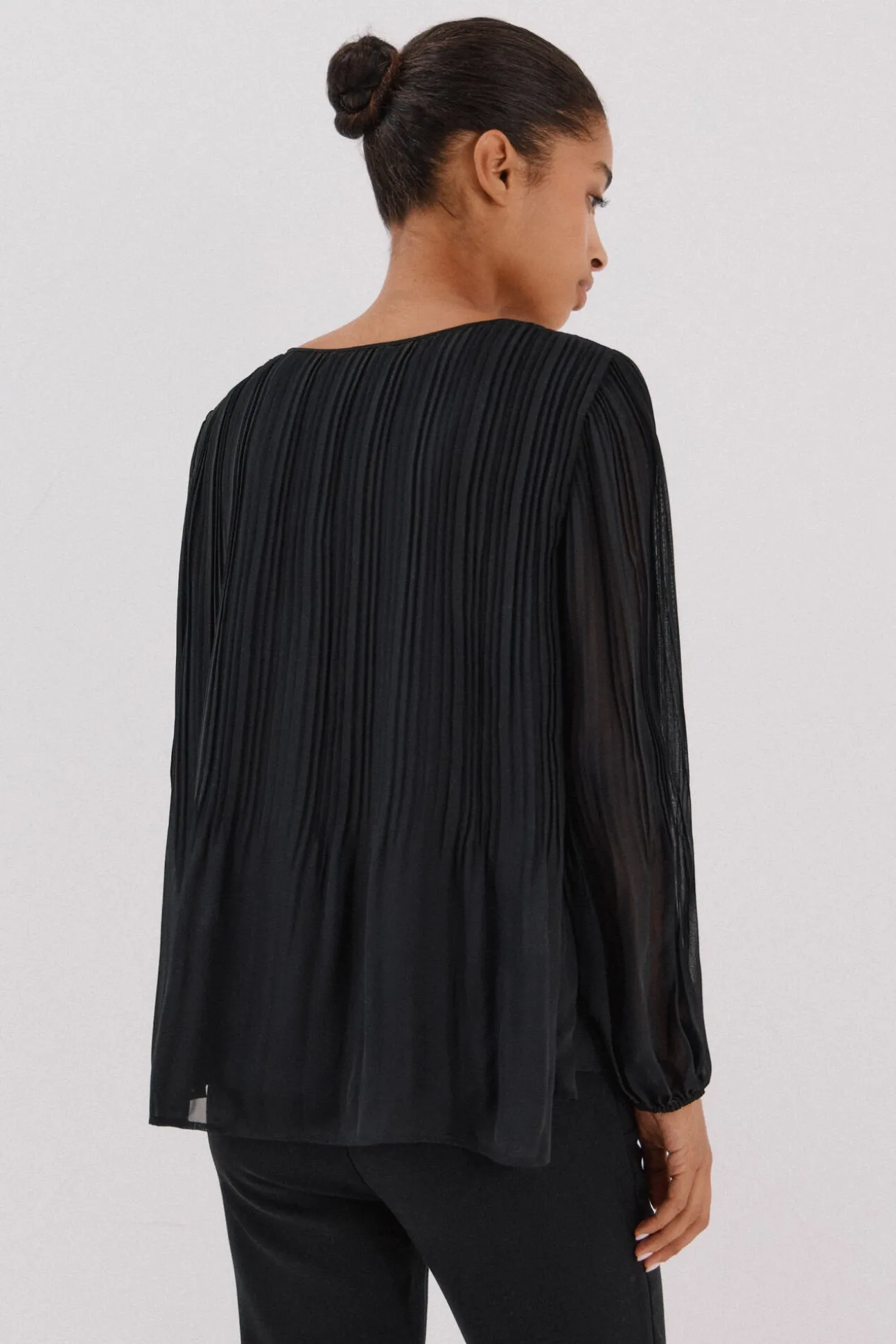 Blusa plisada contraste