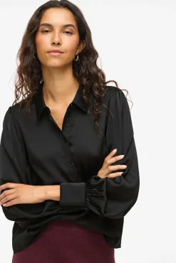 Blusa satinada de manga larga