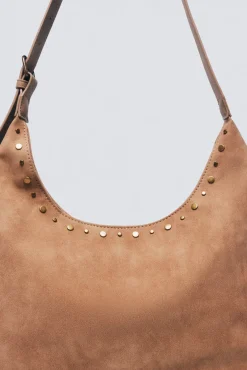Bolso saca tachas