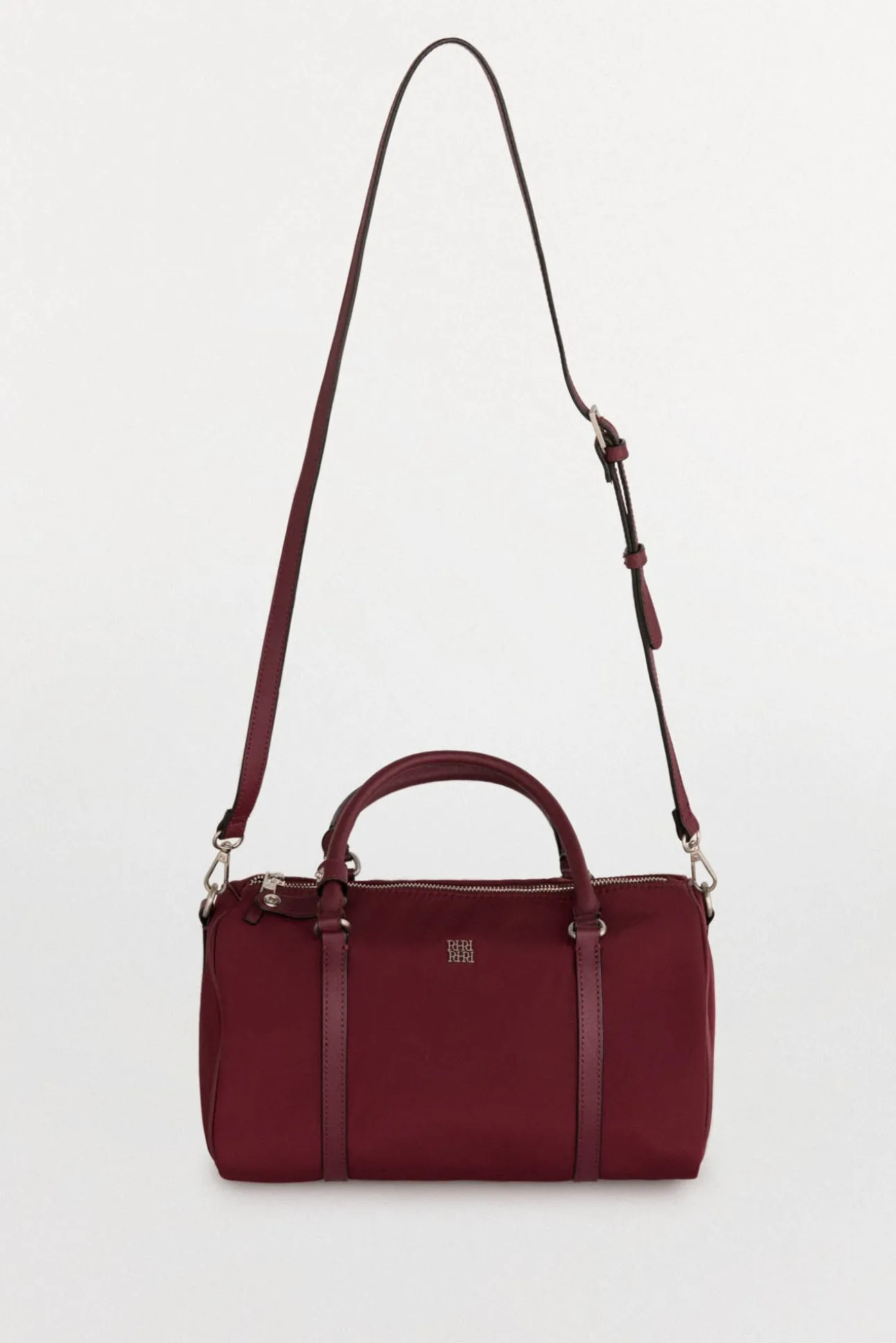 Bolso tipo bowling bandolera