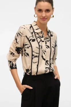 Camisa de manga larga con lineas bordadas