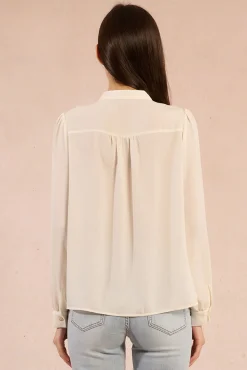 Camisa de manga larga detalle volantes
