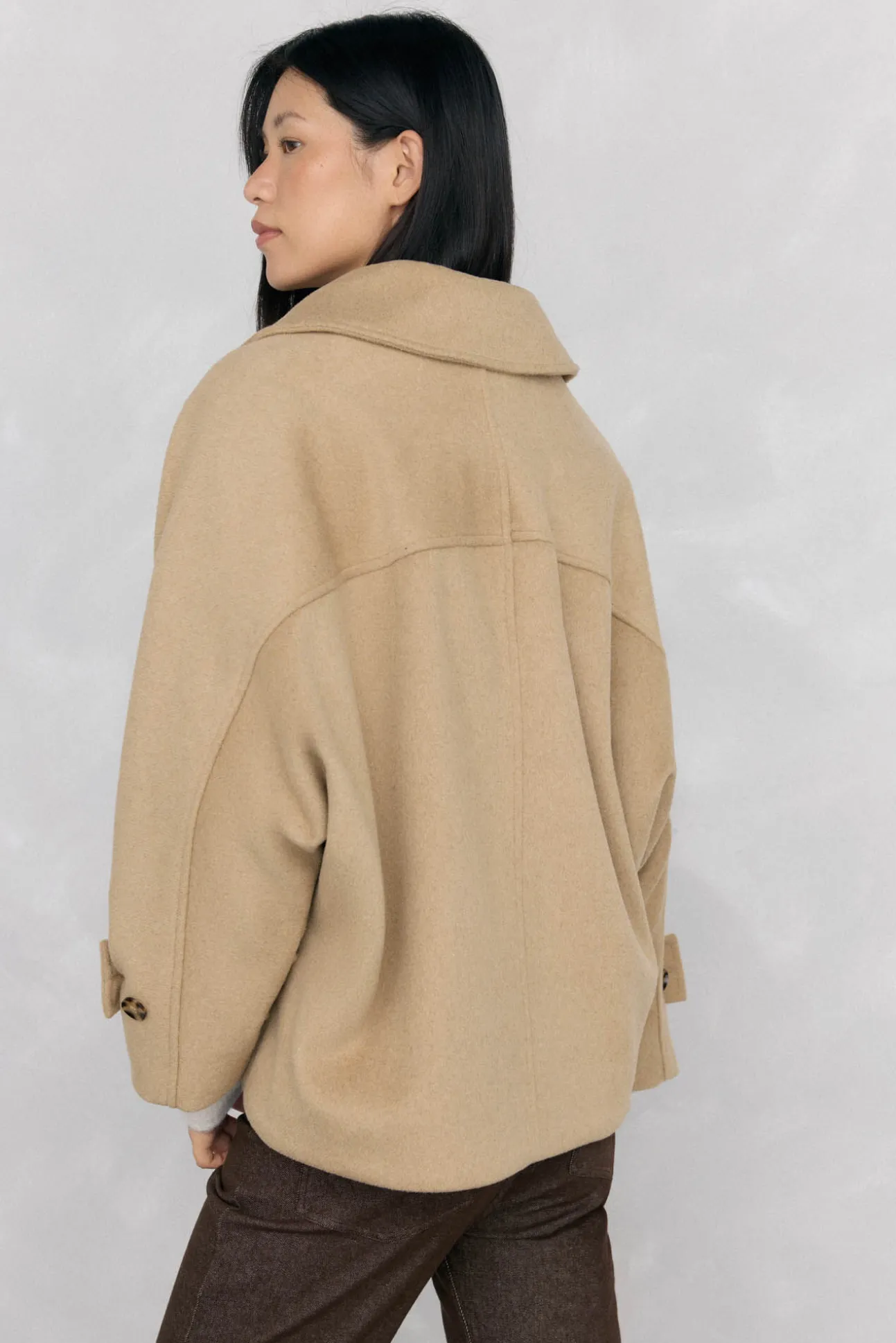 Cazadora tipo capa capucha