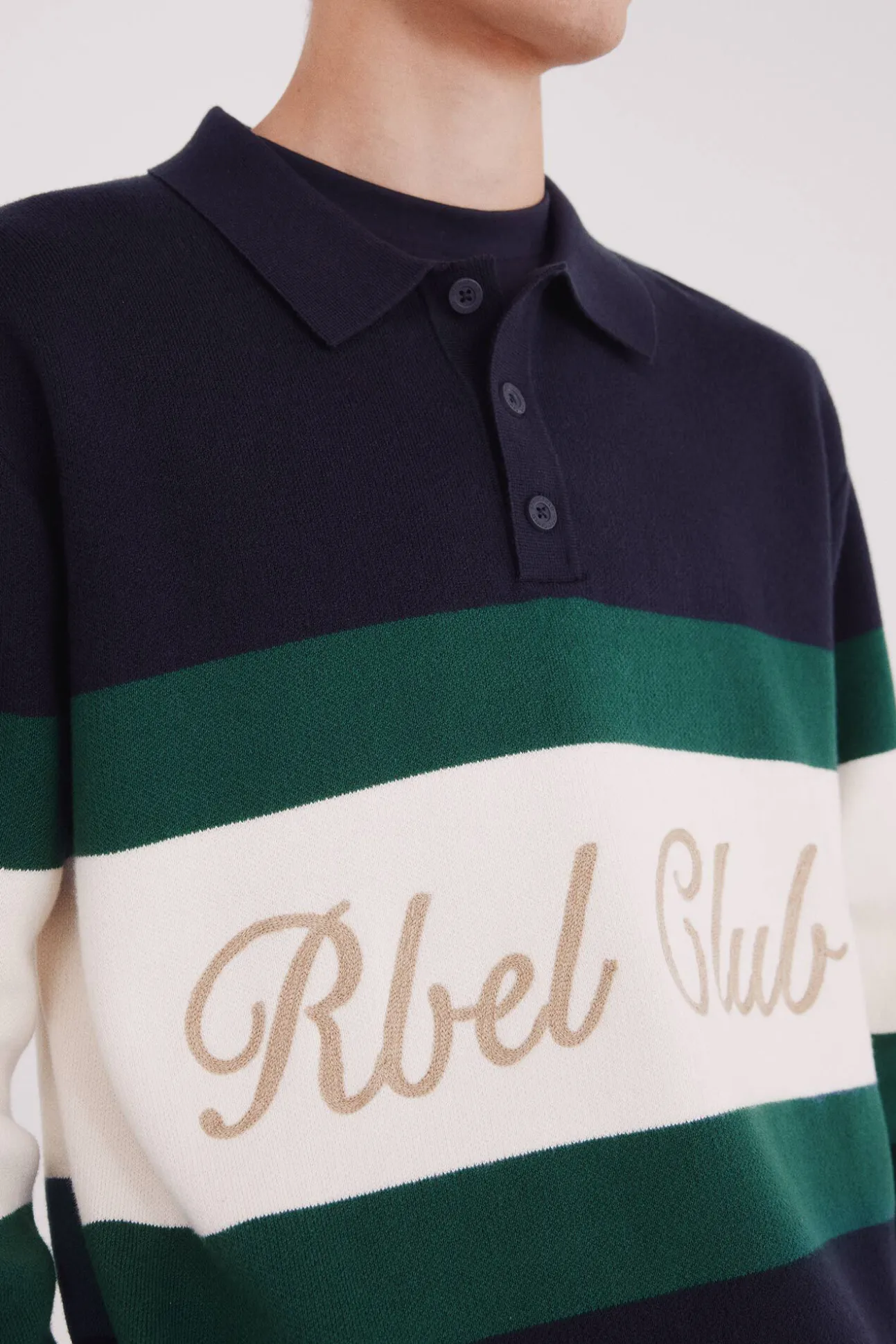 Jersey cuello polo texto bordado