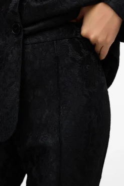 Pantalón acampanado efecto encaje