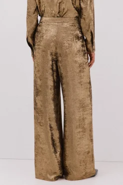 Pantalón dorado palazzo