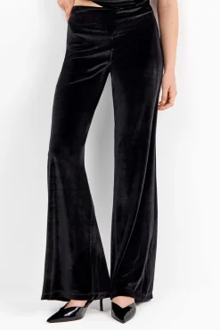 Pantalón largo de terciopelo elástico con diseño elegante