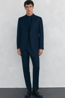 Pantalón ojo de perdiz bi-stretch slim fit