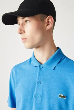 Polo con bordado de cocodrilo pespunteado