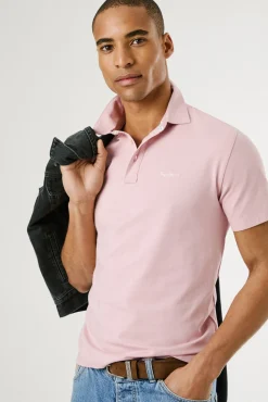 Polo de manga corto con triple botón y logo en el pecho