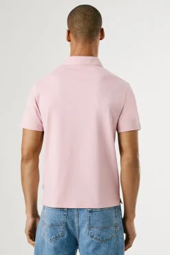Polo de manga corto con triple botón y logo en el pecho