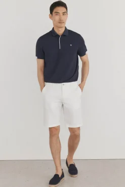 Polo puños contraste