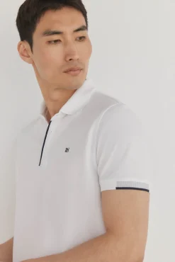 Polo puños contraste