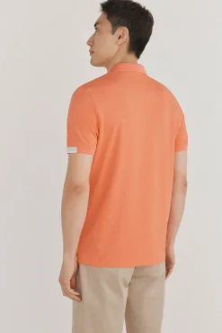 Polo puños contraste