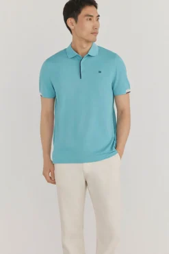 Polo puños contraste