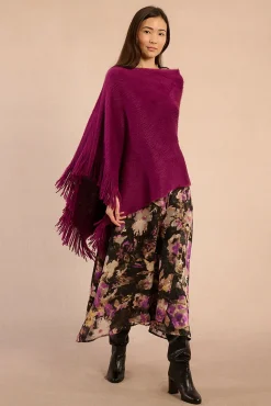Poncho asimétrico con flecos