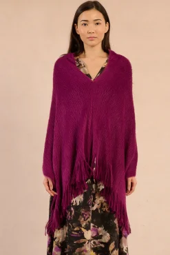 Poncho asimétrico con flecos