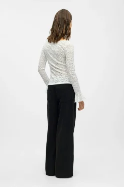Top encaje volante