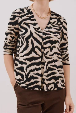 Top fluido pliegue