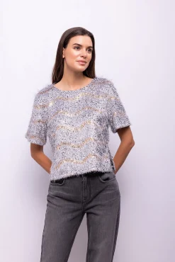 Top lentejuelas y flecos