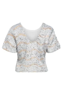 Top lentejuelas y flecos